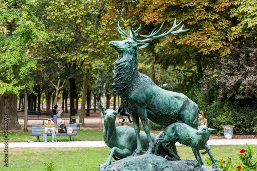Bronze statue of Harde de Cerfs statue by A J LeDuc inside Luxembourg Gardens, Paris, France.