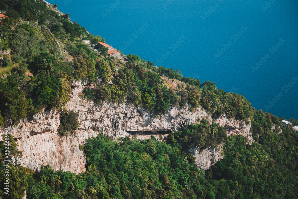 famous hiking trail sentiero degli dei is leading on the top of amalfi coast in italy and except pristine nature visitors can also see cities positano, praiano, nocelle and others.