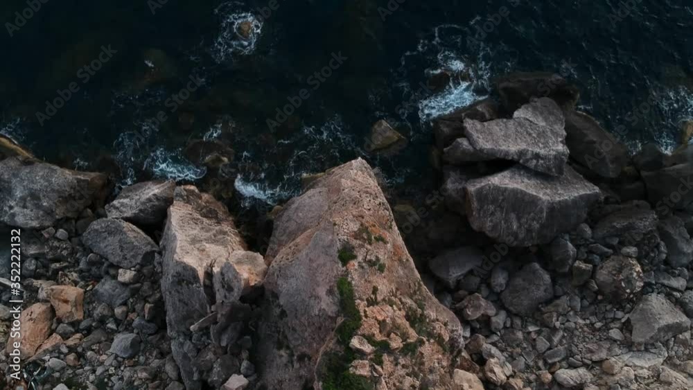 Ravine, cliff or coast where it meets the sea and the waves hit the rocks. Ravine, cliff or coast where it meets the sea and the waves hit the rocks.