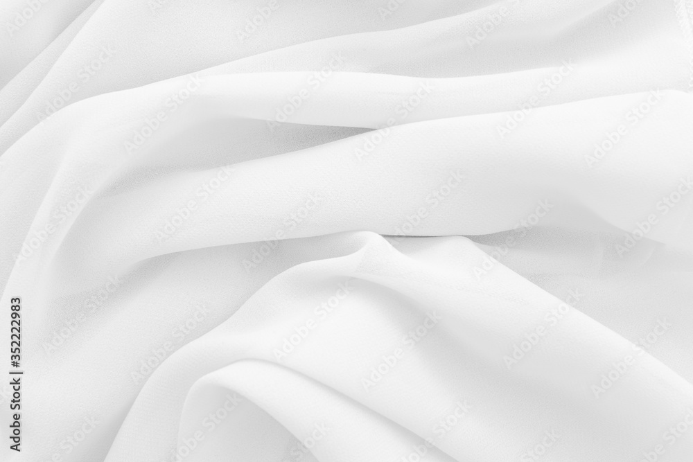 Fototapeta premium Luxury cloth texture with white fabric of silk for backdrop, wedding background. Seamless pattern of satin cotton.