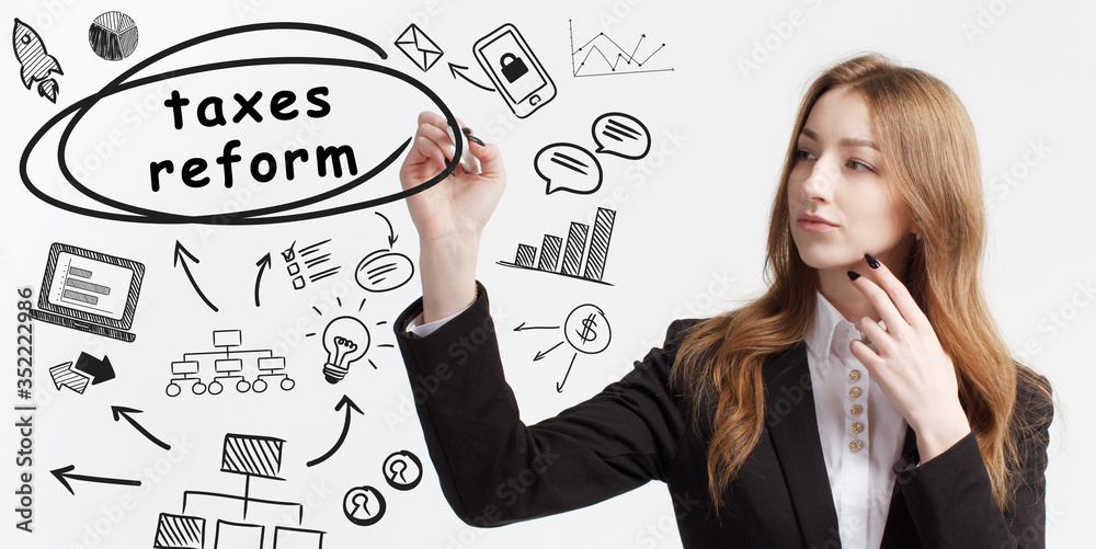 Business, technology, internet and network concept. Young businessman thinks over ideas to become successful: taxes reform Business, technology, internet and network concept. Young businessman thinks over ideas to become successful: taxes reform