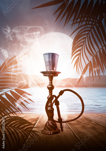 Oriental Hookah on a wooden...