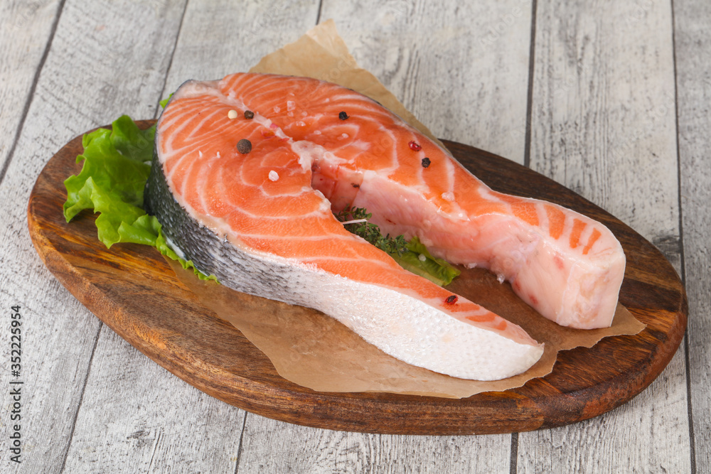 Raw salmon steak - ready for grill Raw salmon steak - ready for grill