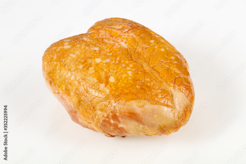 Smoked chicken breast over white background Smoked chicken breast over white background