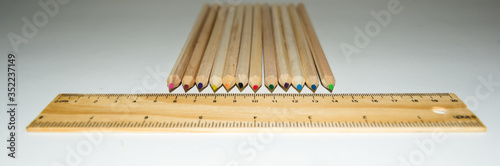 Hexagon Shaped Pencil color and wooden Ruler on isolate white background. 