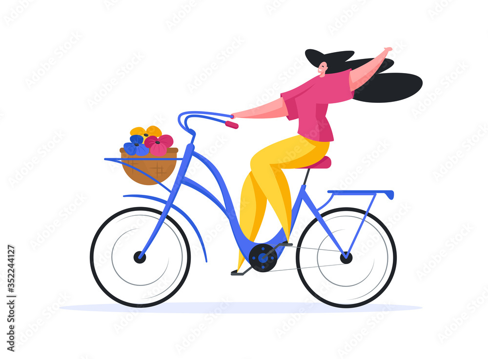 Happy woman riding bicycle with colorful flowers