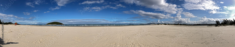 Panoramic landscape of Ibiraquera beach in Santa Catarina Brazil, in a day without anyone.