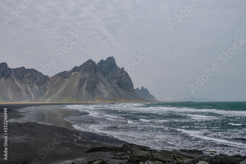 The Vestrahorn mountain on the Icelandic coast jut directly out of the ocean