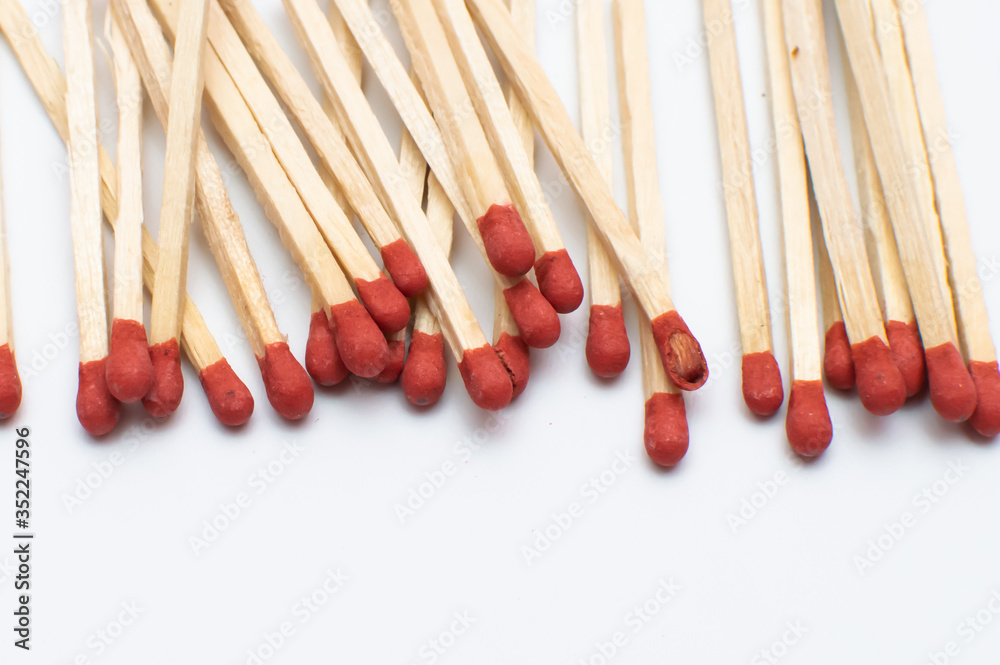A bunch of match sticks on a white background A bunch of match sticks on a white background