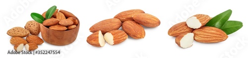 Almonds nuts with leaves isolated on white background with clipping path and full depth of field. Set or collection