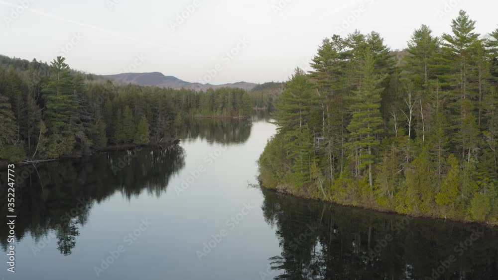Big Greenwood Pond forestry parallax flat calm water Big Greenwood Pond forestry parallax flat calm water