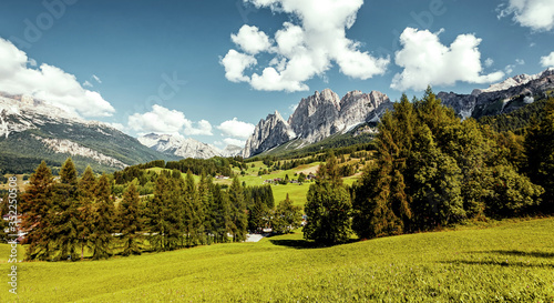 Wonderful Alpine valley of sunny day. Dolomites mountains in summer. beautiful autumn landscape with majestic mountain peak on background
