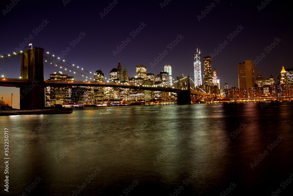 A winter night panorama of the Brooklyn bridge