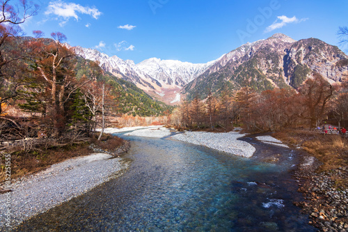 Beautiful autumn season of Kamikōchi is located in the Hida Mountains,the Northern Alps of the Japan Alps. The Azusa River flows the length of the valley, filling Lake Taishō at the base of Mt. Yake.  photo