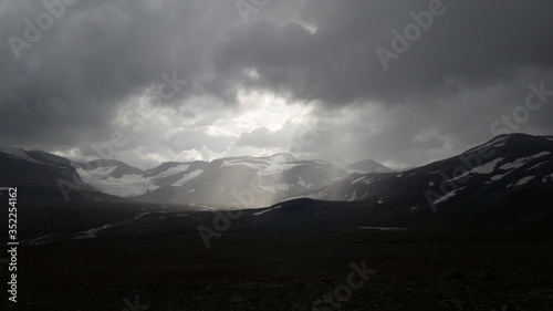 Fototapeta Naklejka Na Ścianę i Meble -  A godly sky in the mountains of Jotunheimen