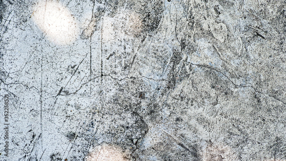Old concrete wall, natural texture. Light background. The shadows. Old concrete wall, natural texture. Light background. The shadows.