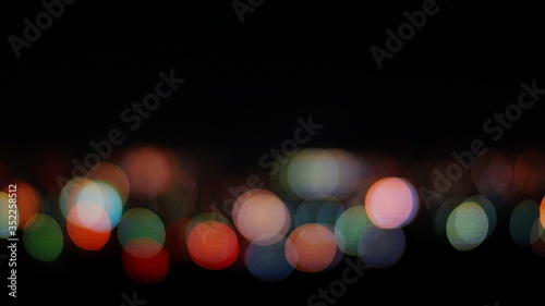 Blurry city lights at night for background. © hunterpic2013