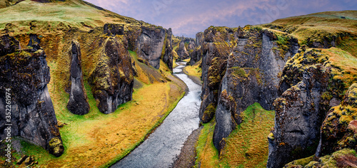 Obraz na plátně Famous Fjadrargljufur canyon in Iceland with colorful sky during sunset