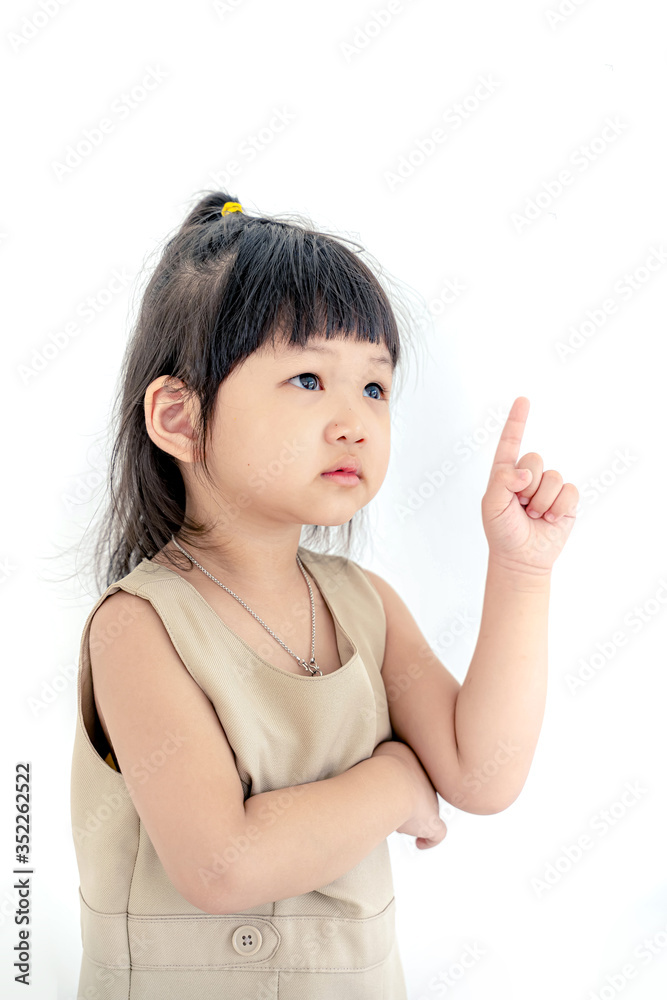 Closeup portrait of a cute little girl thinking. Four years old kid, isolated on white, space for advertising text Closeup portrait of a cute little girl thinking. Four years old kid, isolated on white, space for advertising text