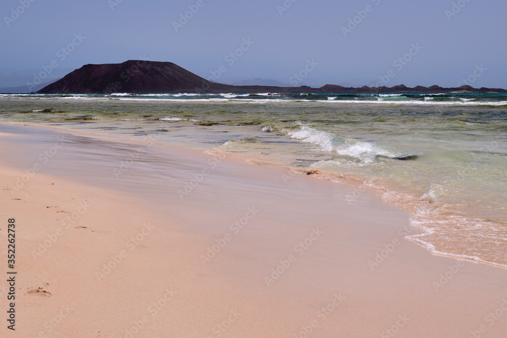 Beautiful view of the sea and the beach of the dunes of Corralejo