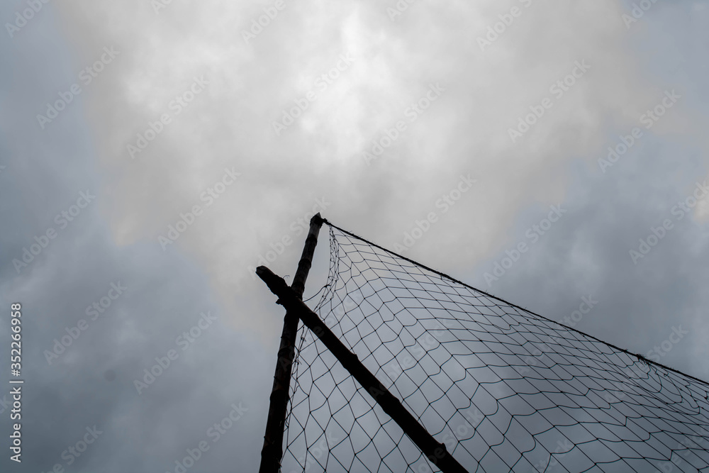 volleyball net against blue sky cloud volleyball net against blue sky cloud