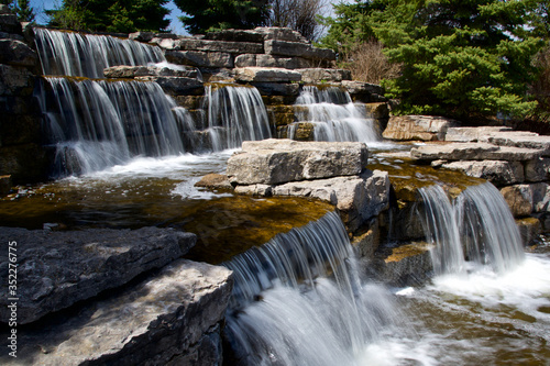 beautiful view of the waterfall in the public park at Richmond Hill, Ontario, Canada