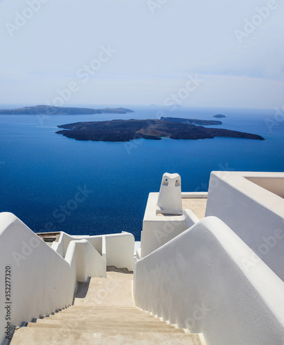 Santorini, Greece. White architecture against blue sea and sky background.