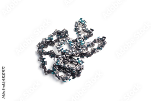 On white background. metal chain for chainsaw. Close-up. Horizontal photo