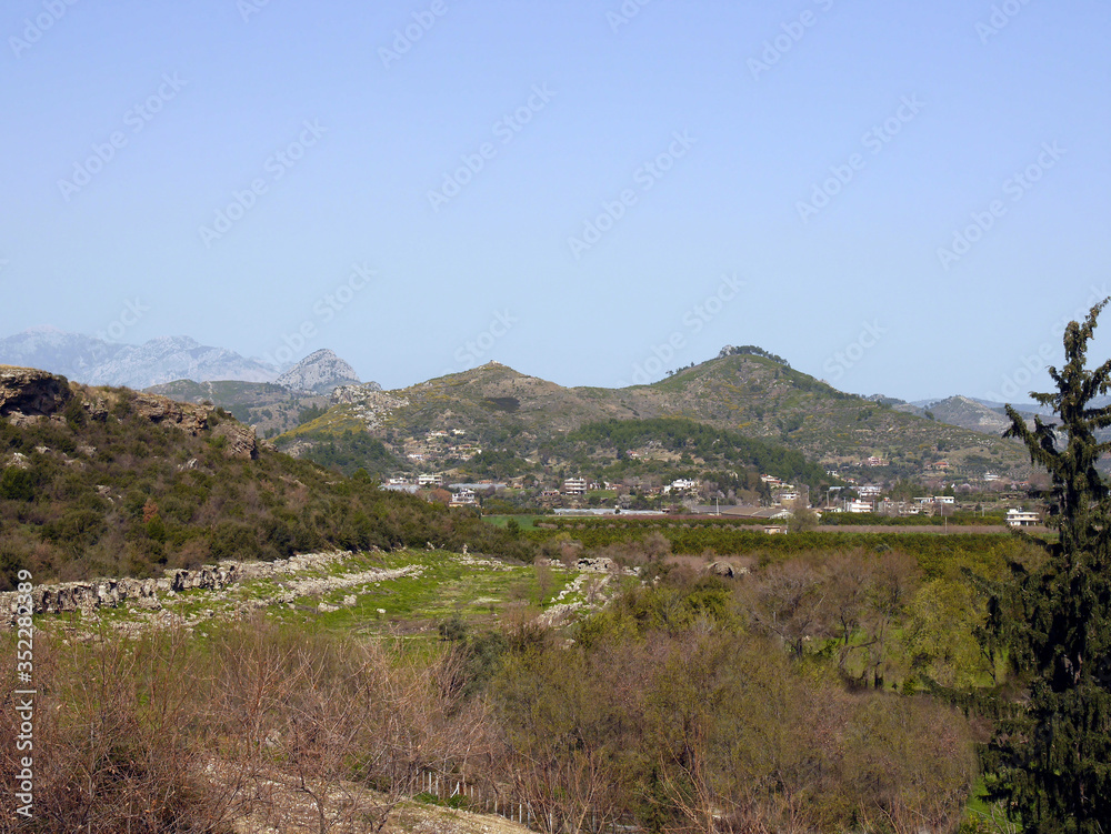 Nature and mountains around the ruins of the ancient city of Aspendos, Antalya southern Turkey Nature and mountains around the ruins of the ancient city of Aspendos, Antalya southern Turkey
