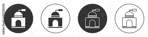 Black Manual coffee grinder icon isolated on white background. Circle button. Vector