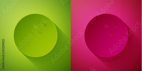 Paper cut Bowling ball icon isolated on green and pink background. Sport equipment. Paper art style. Vector