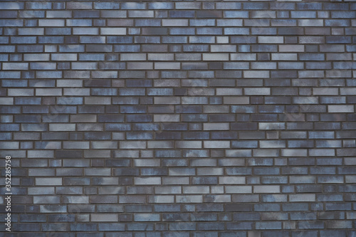 Close-up of a modern blue-gray brick wall