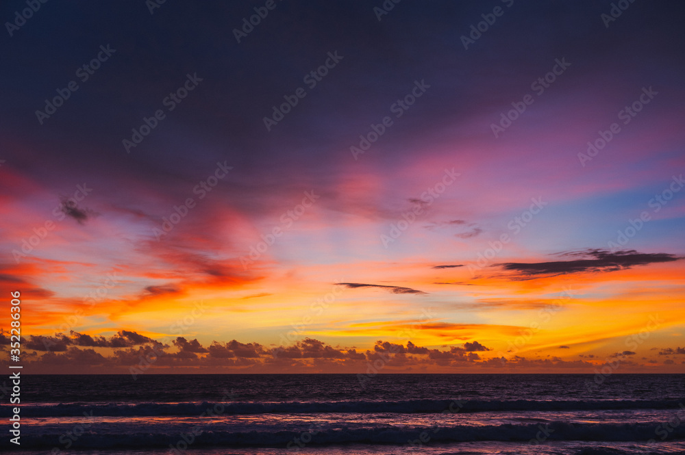 Magical dramatic sunset on a tropical beach.