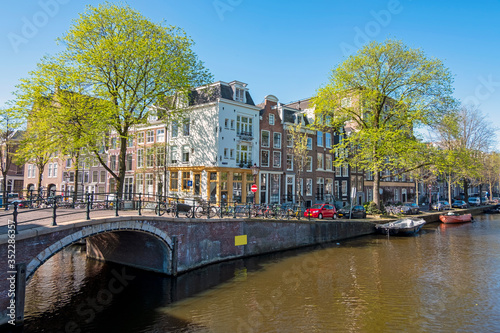 City scenic from Amsterdam at the canals in the Netherlands in spring
