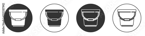 Black Bucket icon isolated on white background. Circle button. Vector