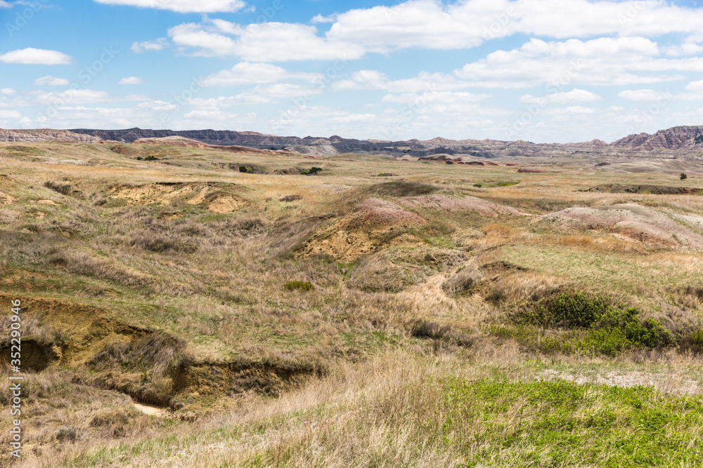 Landscape view of colorful mounds in South Dakota's Badlands National Park.