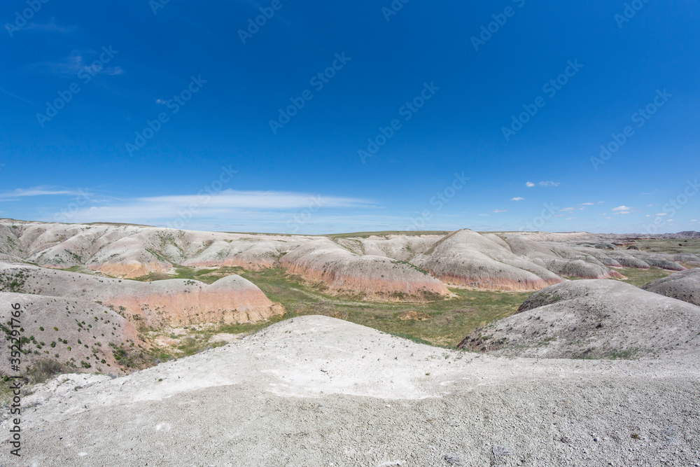 Landscape view of colorful mounds in South Dakota's Badlands National Park. Landscape view of colorful mounds in South Dakota's Badlands National Park.