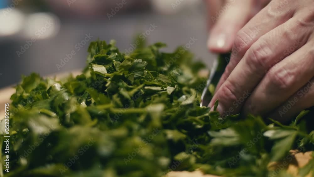 Home Cooking Close Up of Woman Slicing Parsley Home Cooking Close Up of Woman Slicing Parsley