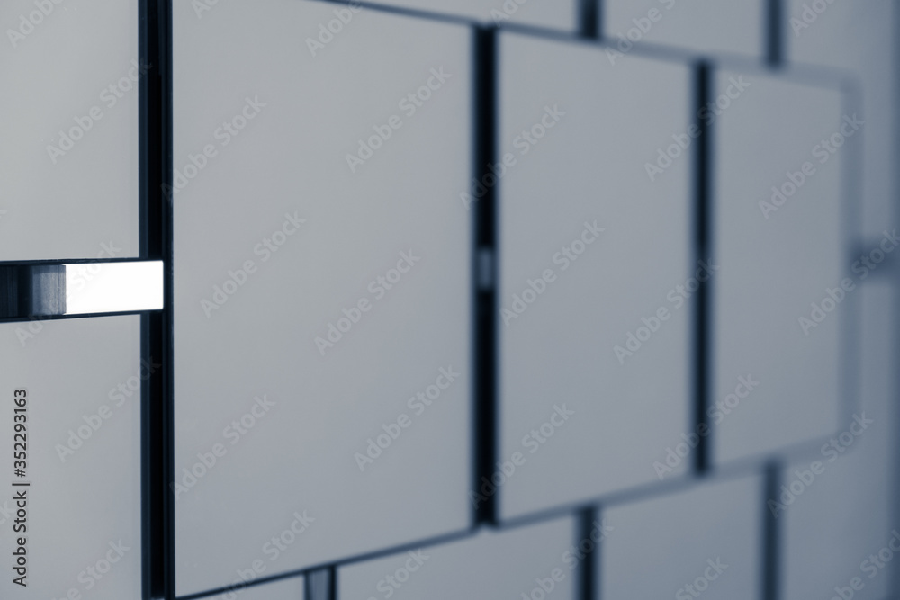 Abstract background created with square-shaped mirrors arranging them according to symmetrical lines, the concept of technological environment. Abstract background created with square-shaped mirrors arranging them according to symmetrical lines, the concept of technological environment.