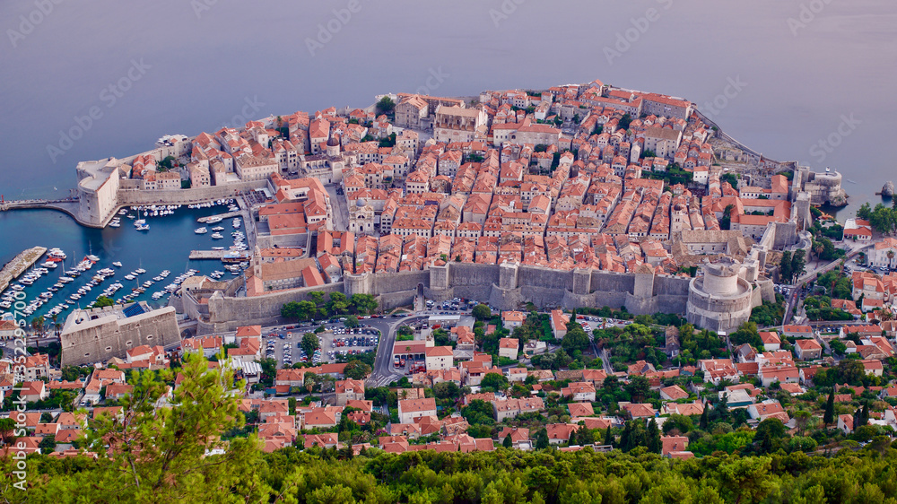 Aerial view of The Old Town of Dubrovnik with City wall, towers, forts and Old Harbour in Dubrovnik, Croatia