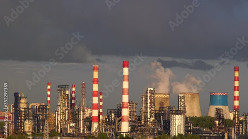 A working petrochemical plant at sunset. Industrial landscape