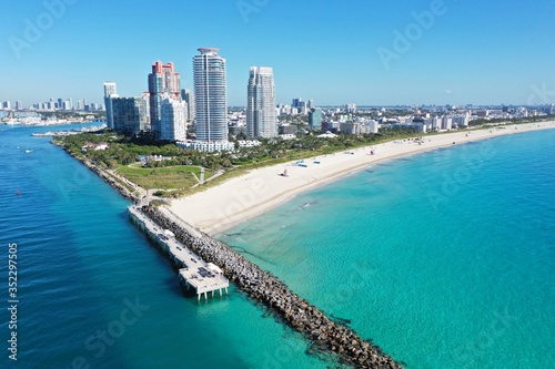 Aerial view of South Beach  South Pointe Park and Government Cut in Miami Beach  Florida on clear sunny summer morning.