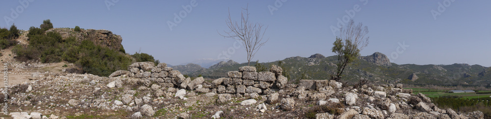 Panoramic view of the Roman amphitheater of Aspendos, ancient city near Antalya, Southern Turkey. Panoramic view of the Roman amphitheater of Aspendos, ancient city near Antalya, Southern Turkey.