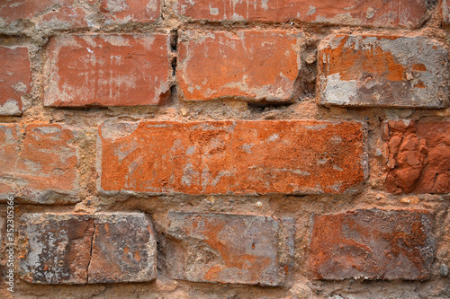 Old red brick masonry. Background