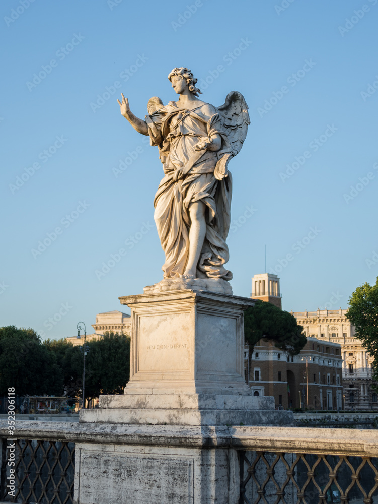 Full size statue of Angel with the Nails on Ponte Sant'Angelo in Rome near Castel Sant'Angelo