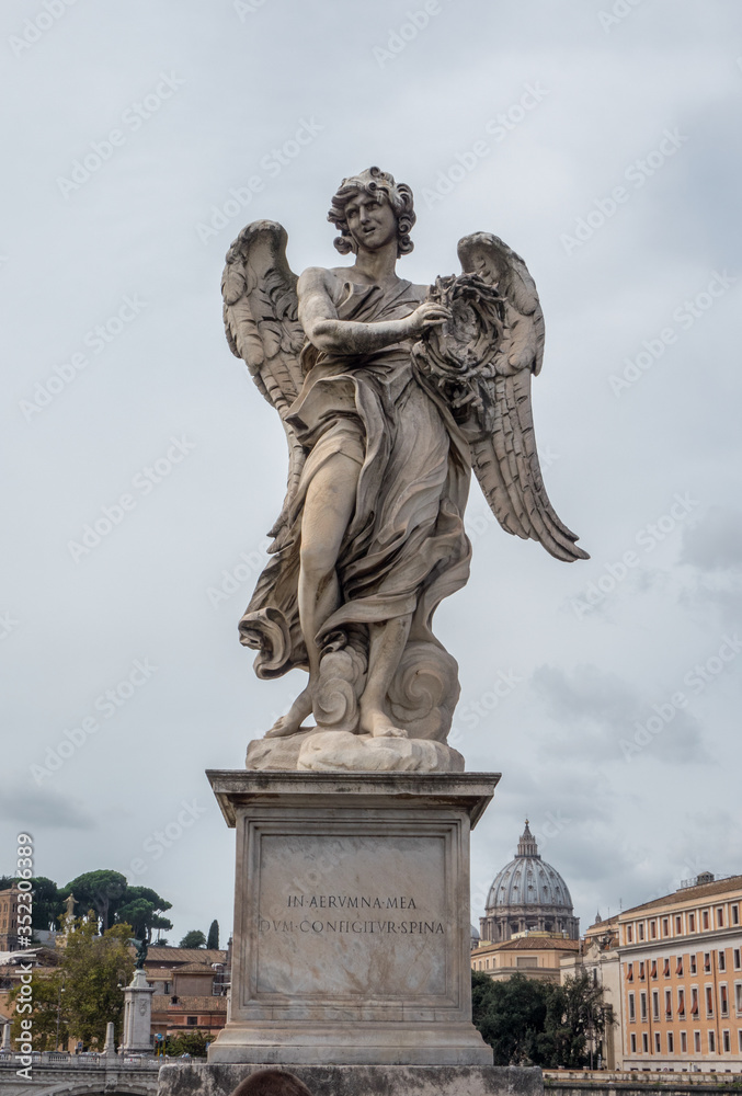 Full size statue of Angel with the Crown of Thorns on Ponte Sant'Angelo in Rome near Castel Sant'Angelo