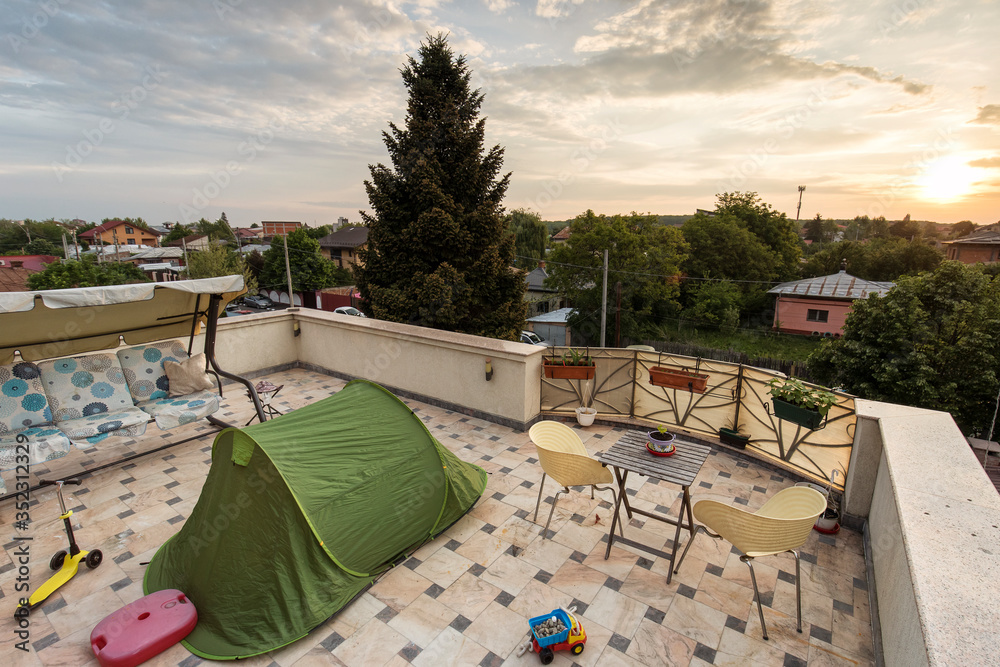 Enjoy adventure at home and staying in tent on the terrace. Enjoying sunrise from home during covid-19 pandemic