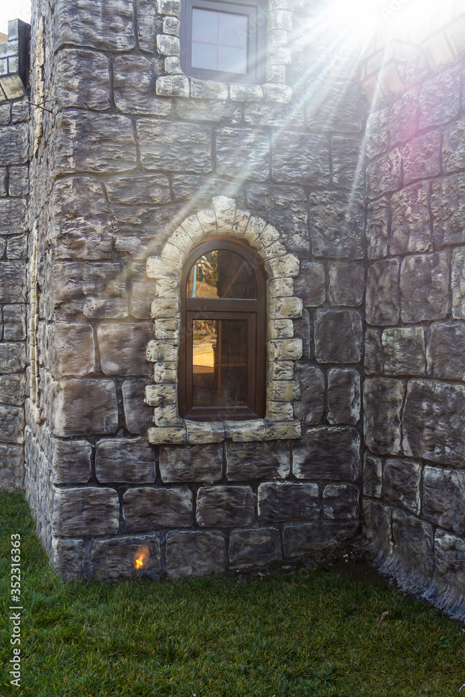 Old historic gray castle in sunny summer weather