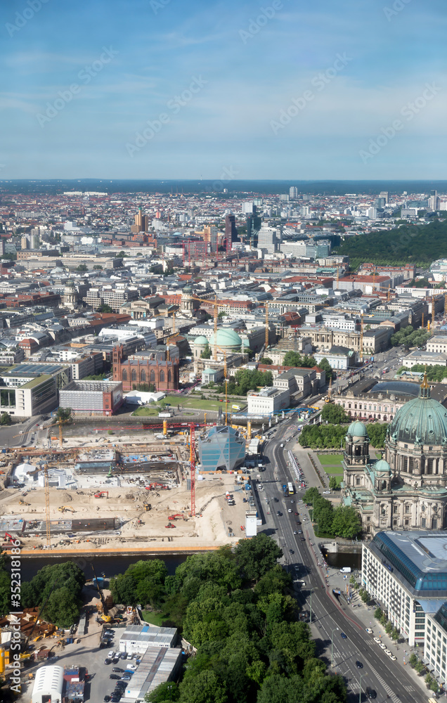 City views of Berlin from a tower in the center of the city during a sunny day in the summer. Districts of Berlin.