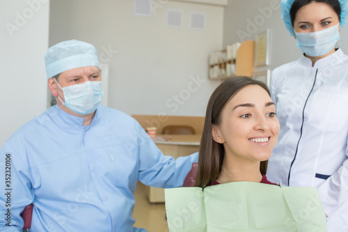 Doctor dentist with patient in clinic
